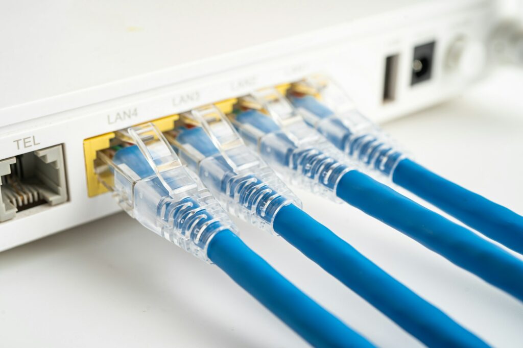 Ethernet cable with wireless router connect to internet service provider internet network.